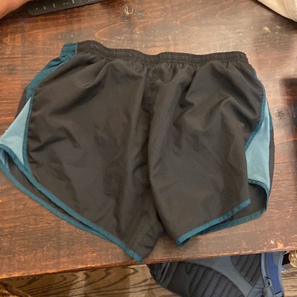 Nike DriFit running shorts, size medium. Color black and blue/turquoise - Picture 4 of 4